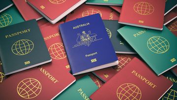 Passport of Australia on the pile of different passports. Immigration concept. Australian passport. 3d illustration