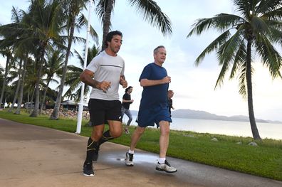 Bill Shorten and Jonathan Thurston running