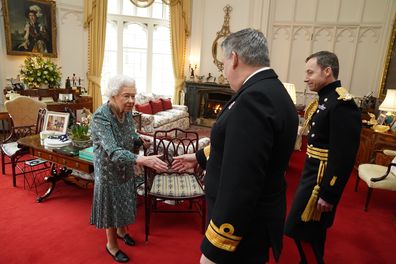 Queen Elizabeth II speaks with Rear Admiral James Macleod  (right) and Major General Eldon Millar as she meets the incoming and outgoing Defence Service Secretaries during an in-person audience at Windsor Castle when she met the incoming and outgoing Defence Service Secretaries at Windsor Castle on February 16, 2022 in Windsor, England. 