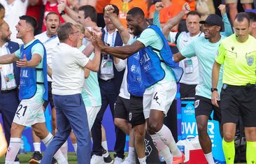 Head coach Ralf Rangnick of Austria and Kevin Danso celebrate a Euros victory.