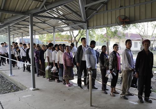 Cambodian villagers lined up on the streets to enter the court and hear the guilty verdict over 1.7 million deaths.