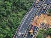 At least 24 dead in China road collapse disaster after record rain