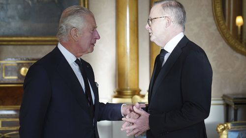 King Charles III speaks with Prime Minister of Australia Anthony Albanese in London.