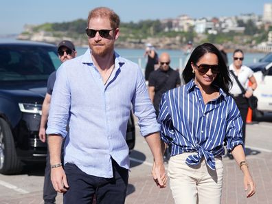 SYDNEY, AUSTRALIA – APRIL 17: Prince Harry, Duke of Sussex and Meghan, Duchess of Sussex arrive to meet volunteer first responders from Bondi Surf Bathers' Life Saving Club, during a visit to Bondi Beach, on day four of the royal trip to Australia on April 17, 2026 in Sydney, Australia. Volunteers from the organisation, founded in 1907, played an integral role in protecting beachgoers and saving lives during the terrorist attack on Bondi Beach on December 14. (Photo by Jonathan Brady-Pool/Getty 