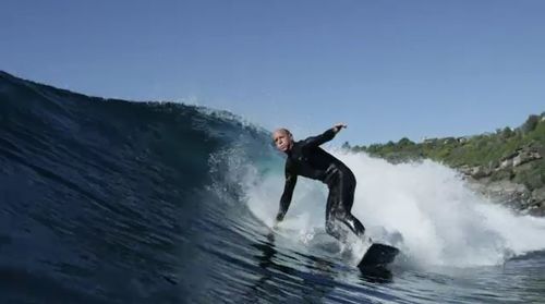 A stricken surfer who was pulled unconscious from the water at Avalon Beach, north of Sydney, has been identified as a local personality known as 'Bob'.