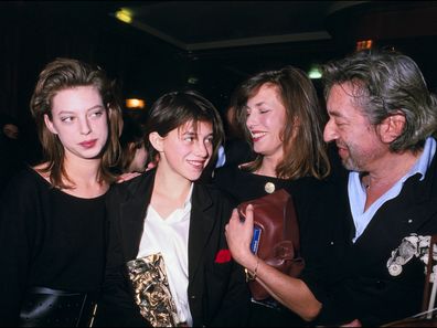 Kate Barry, Charlotte Gainsbourg and parents Jane Birkin and Serge Gainsbourg on February 27, 1986 in Paris, France.  