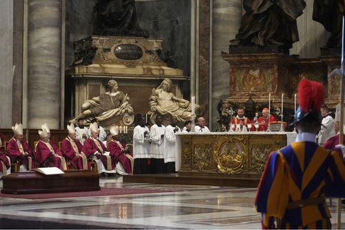 Cardinal Giovanni Battista Re, Dean of College of Cardinals, right, celebrates the funeral ceremony for Australian Cardinal George Pell in St. Peter's Basilica, at the Vatican, Saturday Jan. 14, 2023. 