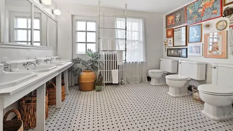 The home has four toilets in the one bathroom.