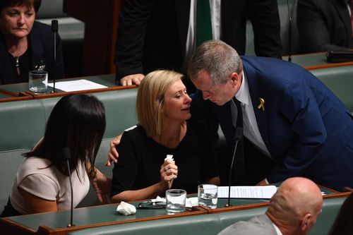 Opposition Leader Bill Shorten consoles Susan Lamb (right) in the House of Representatives (AAP)
