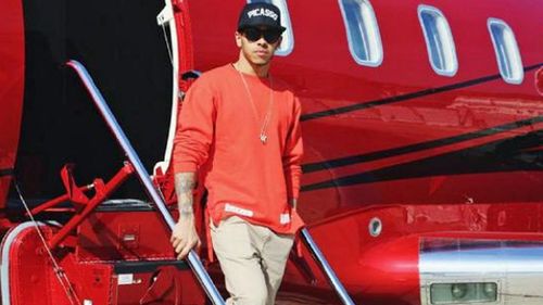 Lewis Hamilton leaves his private jet after landing in Melbourne. (Image: Instagram).