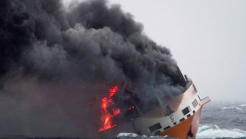 French authorities are working to contain an oil spill off the Atlantic Coast after the Italian tanker Grande America sank following a fire.