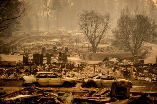 Homes levelled by the Camp Fire line a development on Edgewood Lane in Paradise.