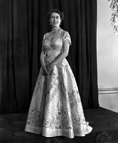 Queen Elizabeth II wearing a gown designed by Norman Hartnell for her Coronation ceremony. June 4, 1953  (Photo by Central Press/Getty Images)