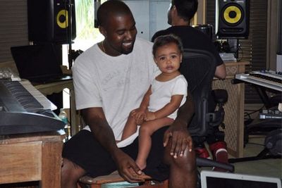 Nawww, look at little North. The one-year-old was snapped in the recording studio with dad Kanye. And what's that...a smile from Kanye himself. Shock horror!<br/>