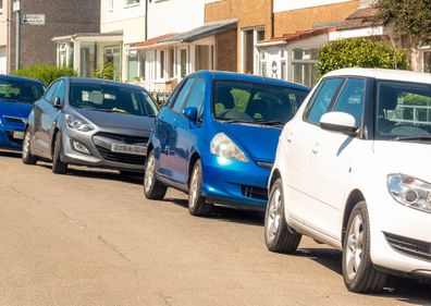 car parked in front of house