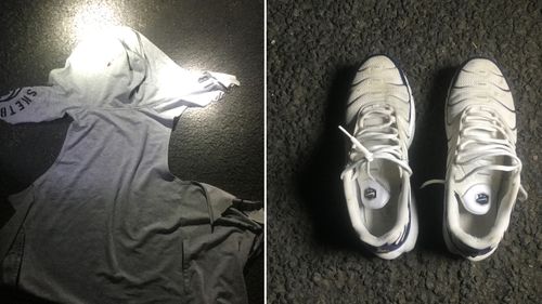 Victorian police hope photographs of a grey hoodie and white trainers can help identify a man found lying on a street last night in Melbourne's east with life-threatening head injuries.