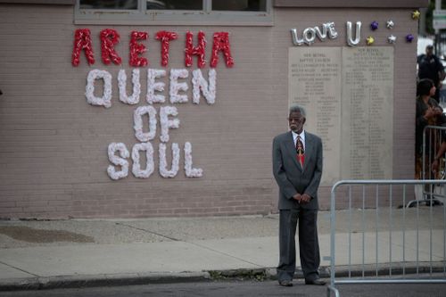 Buildings were decorated with tributes dedicated to Franklin as the hearse passed through the city.