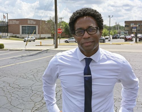 Wesley Bell stands outside the Ferguson, Mo., police headquarters on Wednesday, Aug. 8, 2018, a day after he defeated longtime St. Louis County prosecutor Bob McCulloch in the Democratic primary. Some observers saw the race as a referendum on McCulloch's handling of the fatal police shooting of Michael Brown in 2014. No Republicans are on the November ballot. (AP Photo/Jim Salter) 