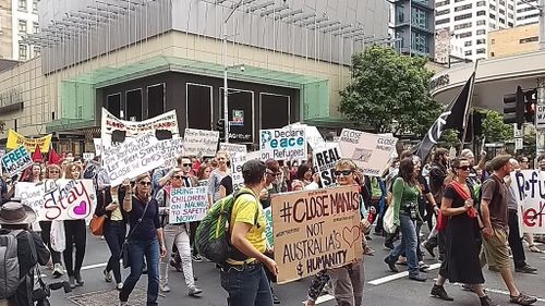 'Close Manus, close Nauru': Protesters call for end to offshore detention with Melbourne and Brisbane rallies