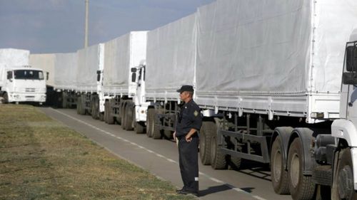 UPDATE: Ukraine accuses Russia of 'invasion' as aid trucks move in