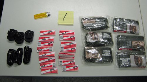 NSW prison guards have found mobile phones, sim cards, chargers and packets of tobacco stuffed in soccer balls.