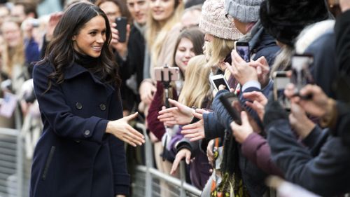 Meghan Markle meets fans in Manchester. (AAP)