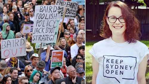 File photo of protesters holding bannersJacqui Munro (left)