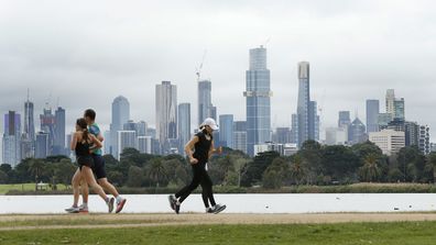 People enjoy their one hour of exercise allowed under stage 4 restrictions at Albert Park on August 16, 2020 in Melbourne, Australia. 