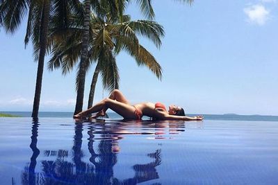 Kim Kardashian has made her way <i>back</i> to Mexico... flashing her taut tum and pert booty all over our Insta-feeds! <br/><br/>And when we say flashing, we really mean it... with Kim lounging 'round in teeny-tiny bikinis for all the world to see. <br/><br/>We've got to say Kim, this <i>does</I> feel like de ja vu! The star only left Mexican waters a few months back after her loved-up honeymoon with hubby Kanye...<br/><br/>Check out her booty-ful vacay snaps here...plus all the action from her wedding day! <br/>