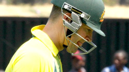 Clarke pulled up in pain attempting a single in his innings of 68 not out against Zimbabwe. (AAP)