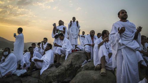 Muslim worshippers pray during the Hajj pilgrimage on the Mount Arafat. (AAP)