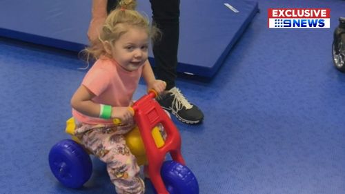 Three-year-old Hayley Henwood is learning how to walk and talk again.