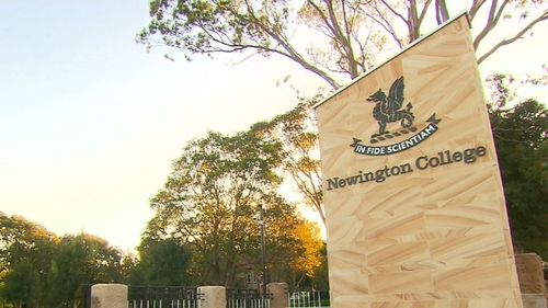 A teacher from prestigious Newington College is facing charges of sharing child exploitation material.