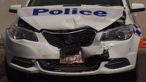 Police car rammed overnight. (9NEWS)