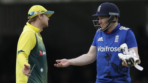 Steve Smith and Eoin Morgan debate Stokes' dismissal. (AAP)