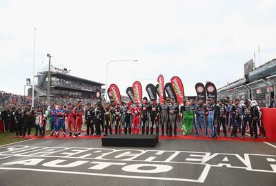 As the drivers lined up for the annual pre-race photo. (Getty)
