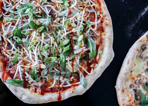 Pictured: the pho pizza has been created by Stretched Pizza in the Melbourne suburb of Coburg. (Supplied)