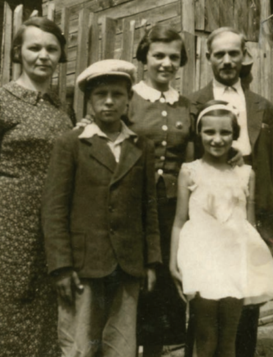 Mira (bottom right) with her mother, brother, sister and father. She had two other brothers who aren't pictured.