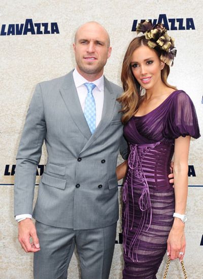 Chris Judd and his wife Rebecca enjoy the carnival mood. (AAP)