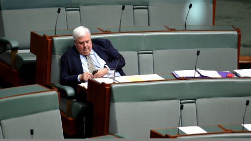 Clive Palmer takes to texts to register his response. (AAP)