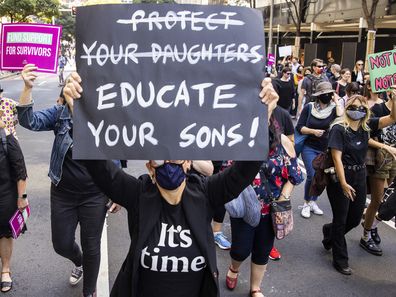 Protesters march towards  Parliament House during March 4 Justice