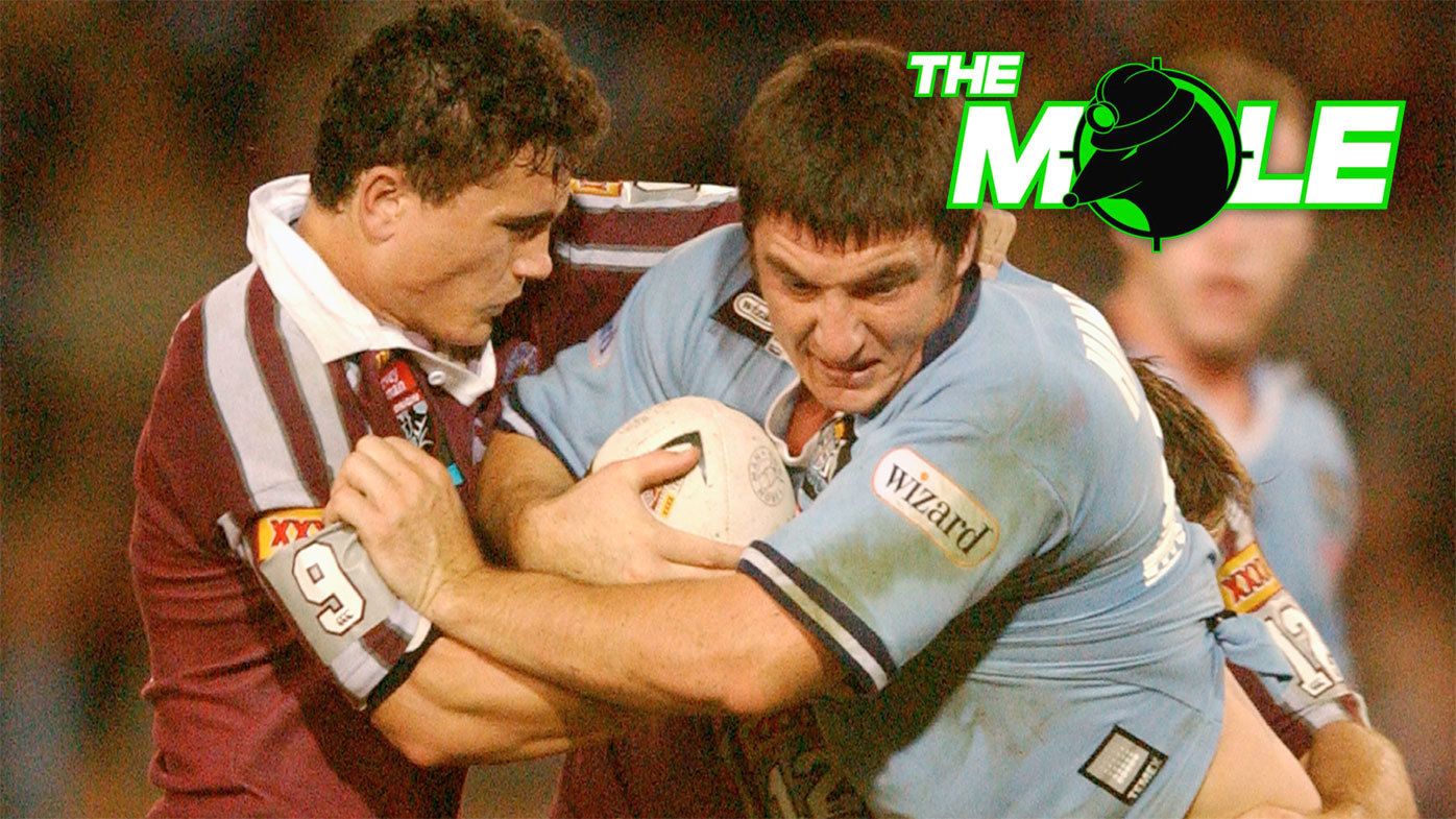 Queensland player PJ Marsh tackles NSW star Nathan Hindmarsh in State of Origin III, 2002.