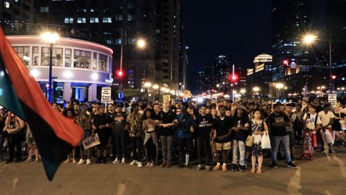 Hundreds protest Chicago police shooting that killed 18-year-old man