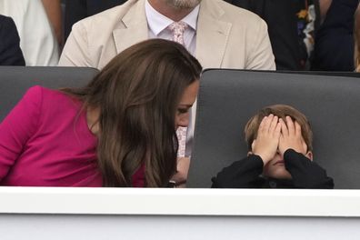 Kate, Duchess of Cambridge, left, and Prince Louis attend the Platinum Jubilee Pageant outside Buckingham Palace in London, Sunday, June 5, 2022, on the last of four days of celebrations to mark the Platinum Jubilee. 