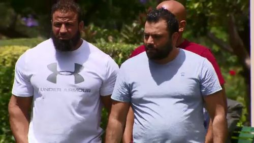 Jihad Darwiche's father Raed (right) attended the funeral with close family friend Ahmad Hraichie.