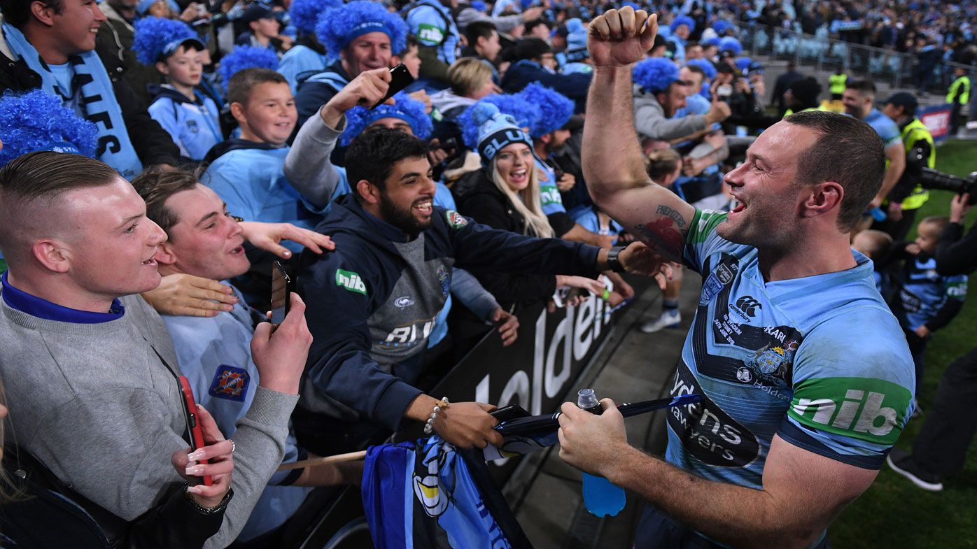 NSW captain Boyd Cordner celebrates with Blues supporters.