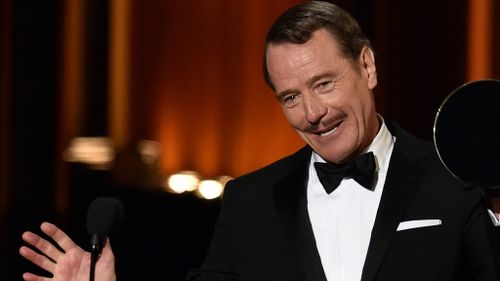 Bryan Cranston accepts his best drama actor award at the Emmys.