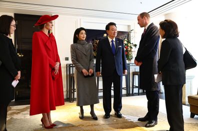 Prince William, Prince of Wales (second right) and Catherine, Princess of Wales (second left) talk with South Korea's President Yoon Suk Yeol and his wife Kim Keon Hee (centre) 