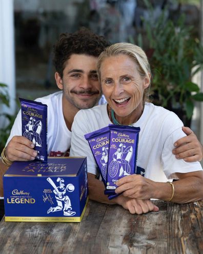 Sam Bloom poses with her son and her Cadbury block.