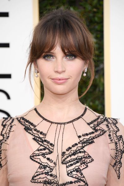 <p>Her gown didn't win our hearts - but Felicity Young's hair and makeup certainly did. Those loose wispy strands gave her look just the right touch of whimsy and her makeup was perfectly pretty.</p>
<p>Image: Getty.</p>